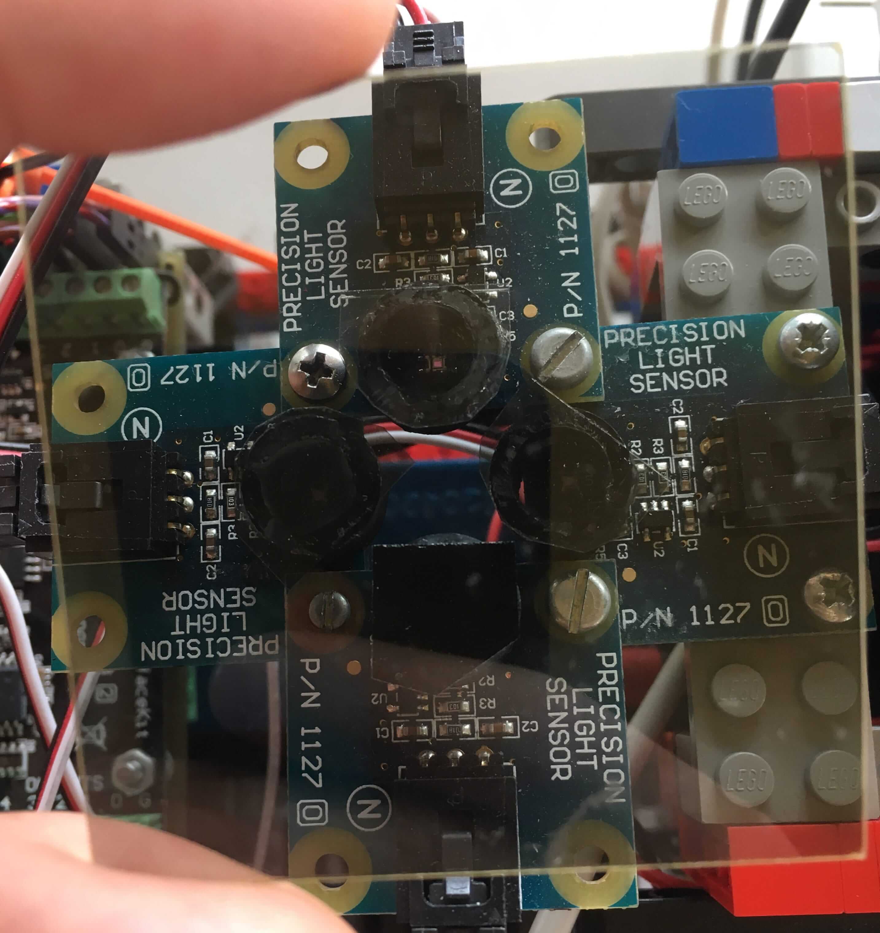 
      Close-up of the custom-built polarisation sensor, consisting of four light
      sensors, each with a differently-angled polarisation filter.
    