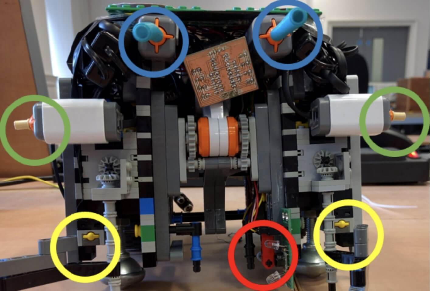 Photo highlighting the visible sensors on the final robot.